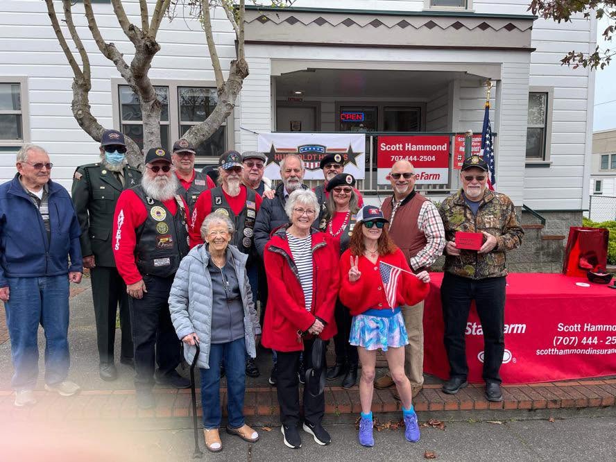 Humboldt Heroes honoree, family, veterans, and community supporters gathered outside the Scott Hammond State Farm office